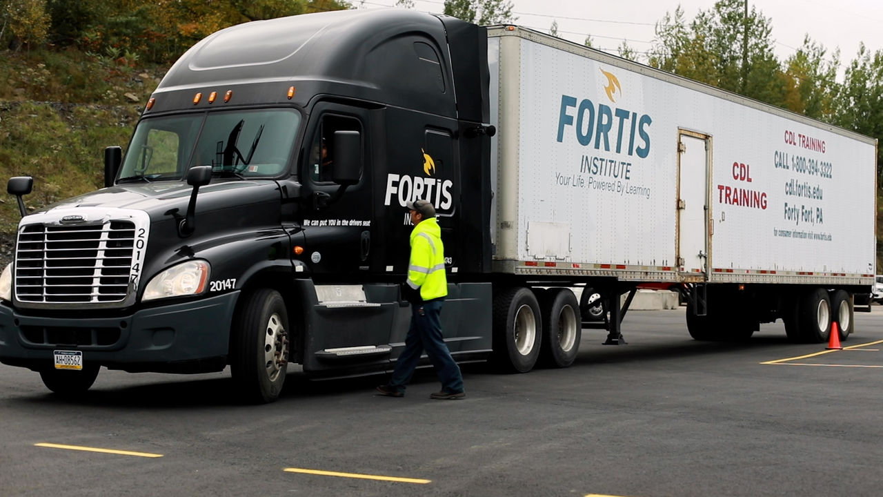 Fortis Institute CDL Training Semi Truck in Parking Lot