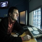 OFFUTT AIR FORCE BASE Neb,.—Dr. Marcus Maydew, radiologist from Creighton University, reviews an x-ray in radiology wing of the Ehrling Bergquist Clinic here April 26. The Ehrling Bergquist Clinic provides complete medical services for eligible beneficiaries enrolled in TRICARE Prime.  

