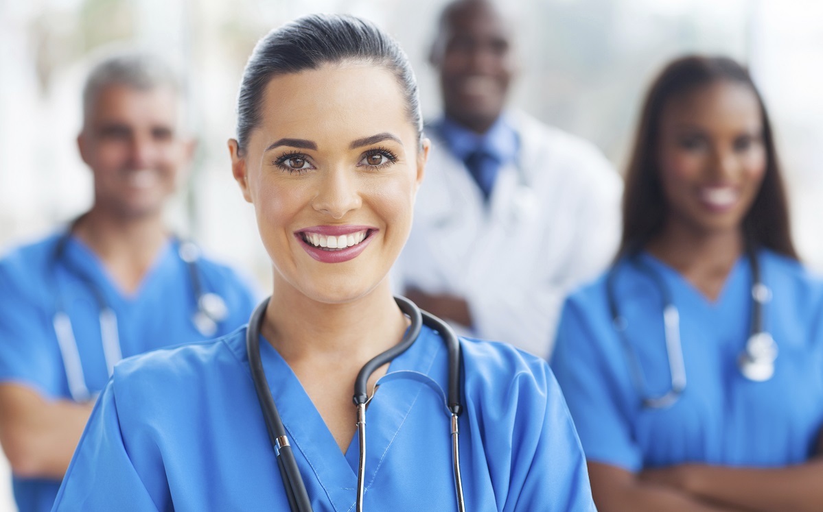 beautiful medical nurse and colleagues in hospital