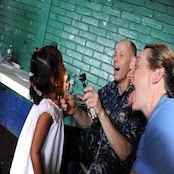 110620-F-ET173-236
SAN JUAN DEL SUR, Nicaragua (June 20, 2011) Cmdr. William Scouten, from Chesapeake, Va., and Nicki Brody, from Phoenix, Ariz., a nurse with Latter-day Saints Charities, examine a patient at the Escuela Humberto Mendez Juarez medical site during a Continuing Promise 2011 medical community service event. Continuing Promise is a five-month humanitarian assistance mission to the Caribbean, Central and South America. (U.S. Air Force photo by Staff Sgt. Alesia Goosic/Released)
