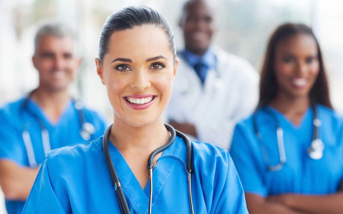 beautiful medical nurse and colleagues in hospital